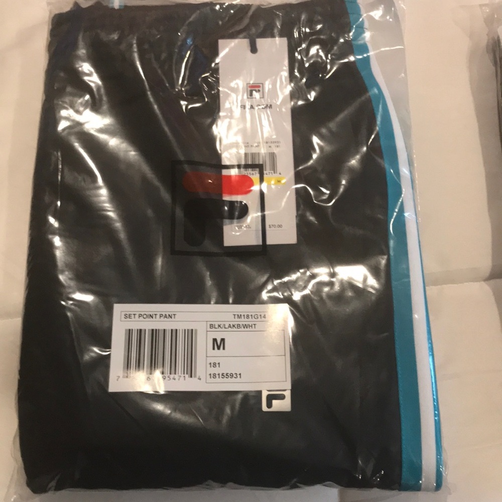 Brand new FILA tennis joggers. NEVER USED